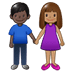 👩🏽‍🤝‍👨🏿 woman and man holding hands: medium skin tone, dark skin tone display on Samsung